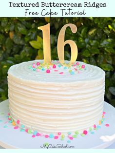 a close up of a cake with the number sixteen on it