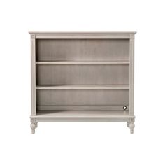 a white bookcase with two shelves on each side and one door open to reveal the bottom