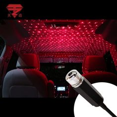 the interior of a car with red lights on it and a white light in the back