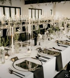 Tall Black And White Wedding Centerpieces, Black Gold And Ivory Centerpieces, Candle Table Wedding Decor, Black Table Runner Wedding Round Table, Classy Black White Wedding, Classic Black And White Wedding Tablescape, Silver And Black Wedding Decorations, Black White Silver Table Setting, Classy Black Wedding Decor