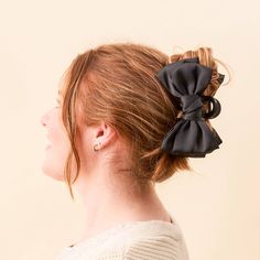 A new way to bow: our Satin Bow Claw Clip. This clip is a stylish and dramatic hair accessory designed to turn heads. Crafted for strength and style, it securely holds all hair types, allowing you to create stunning updos effortlessly. The lightweight satin bow design adds elegance, while the clip holds your hair comfortably. Lightweight satin bow design secured on both sides of clip Dimensions: 6”L x 3”W x 2.5”H Bow Claw Clip, Dramatic Hair, Chic Hair, French Girl Style, Long Sleeve Outerwear, Hair Claw Clip, Securely Attached, Hair Scarf, Your Hairstyle