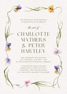 a wedding card with watercolor flowers on it