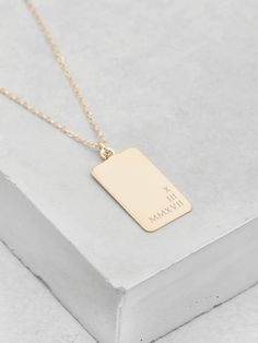 "To add back side engraving, please add this upgrade to your cart: https://www.etsy.com/listing/853742520/double-sided-engraving This customizable tag necklace is on the fast track to become one of my best selling necklaces to date. All letters are engraved and *not* stamped. This tag is big enough to have so many different layout and text options but is still the perfect size to look dainty. Add your name, a quote or an important date on the necklace - the sky's the limit for this one! The 10x1 Tag Letters, Lucky Charm Necklace, Engraved Bar Necklace, Bar Necklace Personalized, All Letters, Elephant Necklace, Gold Name Necklace, Cluster Necklace, Elephant Charm