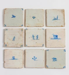 six blue and white tiles with people on them