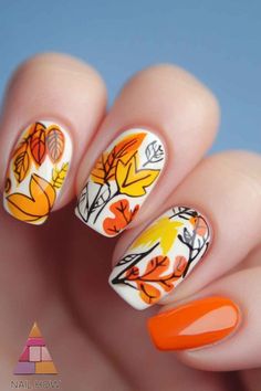 Fall vibes all around! 🍁 These Thanksgiving nail designs combine warm orange hues with delicate leaf patterns for the perfect seasonal touch. Ideal for your Thanksgiving dinner or any autumn gathering. Visit nailhow.com for more inspiration and save this pin to your favorite nail art board! Autumn Gathering, Leaf Patterns