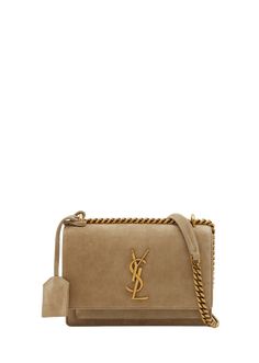 "Find SAINT LAURENT Sunset Small Ysl Crossbody Bag In Suede on Editorialist. Saint Laurent \"Sunset\" cross bodysun bag in suede and leather Features YSL logo lettering Sliding chain/suede shoulder strap can be doubled; removable tag Flap top with magnetic closure Exterior, one slip pocket under flap Divided interior Approx. 7.5\"H x 5.1\"W x 3.1\"D Professional cleaning recommended Made in Italy" Ysl Crossbody Bag, Ysl Logo, The Saint, Professional Cleaning, Chain Shoulder Bag, Magnetic Closure, Saint Laurent, Crossbody Bag, Shoulder Strap