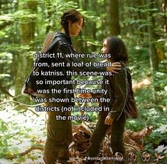 two people standing in the woods talking to each other with a quote on it that reads district 11 where rue was from, sent