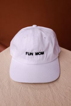 "Im not like a regular mom , I'm a fun mom." Intentionally Blank "Fun Mom" dad hat saying it all for you. cool mom One size. Adjustable back. Hand embroidered in LA. PIPE AND ROW Funny Adjustable Dad Hat Baseball Cap, Adjustable Curved Brim Fun Dad Hat, Funny One-size Dad Hat Baseball Cap, Funny Adjustable Dad Hat With Curved Bill, Fun Dad Hat For Streetwear, Adjustable Fun Dad Hat For Streetwear, Fun Adjustable Dad Hat For Streetwear, White Funny Snapback Hat, Fun Streetwear Dad Cap