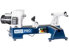 a machine that is sitting on top of a blue and white stand with the words mid pro