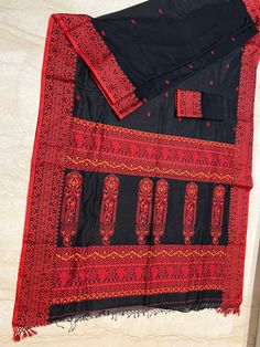 An exclusive Baluchari style Bengal handloom cotton saree . The whole saree woven with reshsm threads. Premium qualitycotton saree . Very soft , easy to carry. Cotton Traditional Wear With Woven Motifs For Ceremonies, Bohemian Cotton Handloom Traditional Wear, Bohemian Handloom Cotton Traditional Wear, Bohemian Cotton Traditional Wear With Handloom Detail, Unstitched Black Handloom Blouse Piece, Traditional Cotton Fabric With Embroidered Patterns, Bohemian Handloom Cotton Saree, Unstitched Cotton Traditional Wear With Woven Motifs, Unstitched Saree With Woven Motifs In Traditional Drape