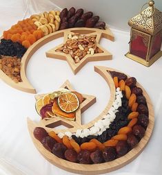 an assortment of fruits and nuts arranged in the shape of a star