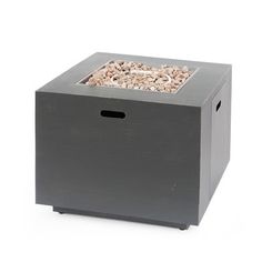 an outdoor fire pit with gravel in the center and wood frame around it on a white background