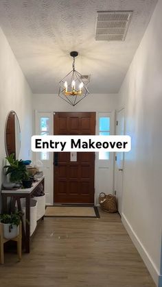 entry makeover with wood flooring and white walls in an empty house or apartment