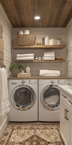 a washer and dryer in a room with wood paneling on the walls