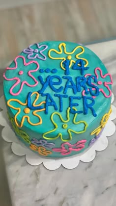 a birthday cake with the words year after written on it