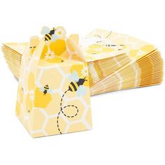 bees and honeycombs are wrapped in yellow paper