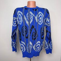 Royal blue swirly squiggle design pullover sweater from the 90s Brand - Vision Content - 80% Acrylic 20% Cotton Size - Approximately a modern Medium but please check all measurements to ensure fit Shoulders - 23" across Chest - 21.5" pit to pit  Length - 26.25"  Sleeves - 21.25" from shoulder seam Condition - I don't see any flaws Swirly Blue Sweater, Blue Long Sleeve Retro Sweater, 90s Blue Cotton Sweater, Brand Vision, Blue Jumper, Casual Skirts, Sweatshirt Shirt, The 90s, Sweater Skirt