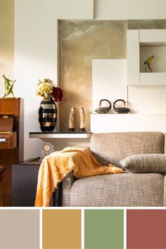 a living room filled with furniture and lots of color swatches in shades of brown, green