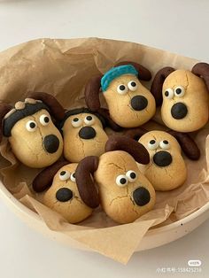 some cookies that have been decorated to look like dogs