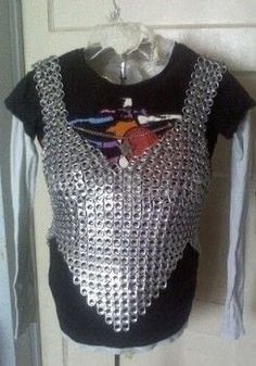 a black top with silver sequins on it