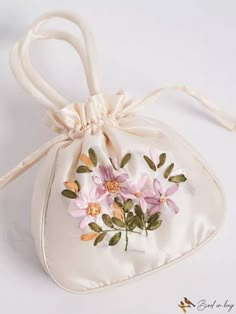 BirdinBag - Chic Mini Embroidered Bucket Bag with Drawstring Closure Handmade Bags For Spring Wedding, Spring Wedding Handmade Bags, Embroidered Pouch Bag For Spring, Spring Embroidered Pouch Bag, Spring Embroidered Shoulder Bag For Gift, Spring Embroidered Pouch Shoulder Bag, Beige Embroidered Bags As Gifts, Embroidered Bags For Spring Gift, Embroidered Cream Bags For Gifts