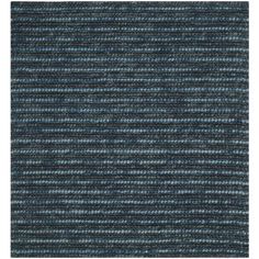 a blue rug with vertical stripes on it