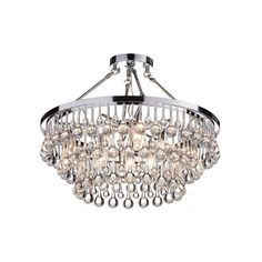 a chrome finish chandelier with clear crystal balls hanging from the bottom, on an isolated white background