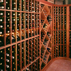 a wine cellar filled with lots of bottles