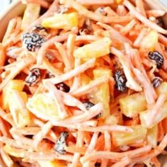 a bowl filled with lots of food on top of a table