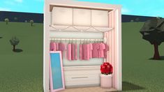 an open closet with clothes hanging on it