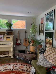 a living room filled with lots of furniture and musical instruments in it's walls