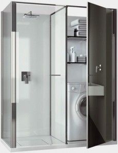 a bathroom with a washer and dryer inside of it, including the door open