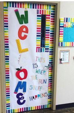 a door decorated with colorful paper and school supplies