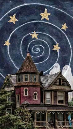 a house with stars painted on the roof and in the sky above it is a spiral design