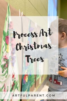 a young boy looking at art on the wall with text overlay that reads process art christmas trees