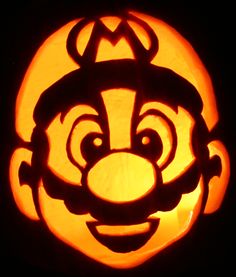 a pumpkin carved to look like an evil clown