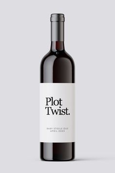 a bottle of wine with the label plot twist on it's front and side