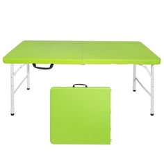 a green table with a laptop on it and a briefcase under the table next to it