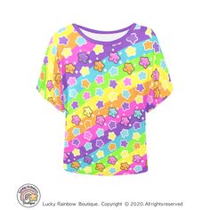 A Batwing Sleeve Top with an all over Rainbow Stripes and Stars Print with a contrating bright Purple Scoop Neck. Material is Polyester keep cool, casual and colourful in this beautiful and Bright Batwing Tshirt. It's slouchy loose fit makes it super comfy and easy to move in with no restrictions. Dress this tee up or down to tailor it to your dream Kawaii aesthetic, a true Rainbow lovers Wardrobe staple! Garment Details: - Fabric Composition. 100% Soft Polyester Fabric - Dye Sublimation Printin Batwing Tshirt, Clothes Kidcore, Mode Harajuku, Batwing Sleeve Top, Star Tshirt, Kawaii Clothing, Batwing Top, Garment Details, Makeup Clothes