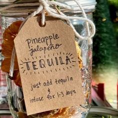 a jar filled with dried fruit sitting on top of a table