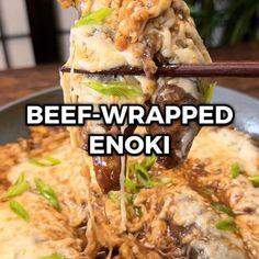 a spoon full of food with the words beef - wrapped enoki on it