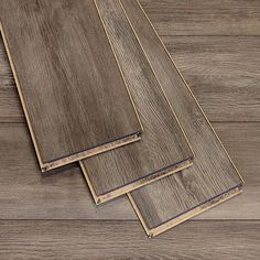 three different types of wood flooring laying on top of each other