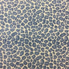 a blue and white animal print fabric