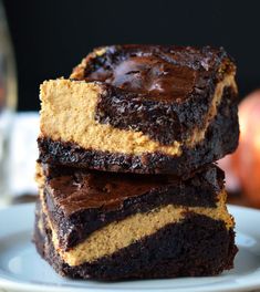 three brownies stacked on top of each other with peanut butter and chocolate in the middle