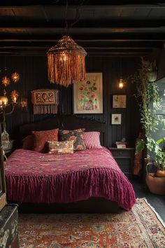 a bedroom with a bed, rug and chandelier hanging from it's ceiling