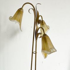 Incredible vintage regency metal and glass floor lamp. Features three glass tulip lamp shades on three gold stems. Tulip Lamp, Glass Floor Lamp, Glass Floor, Desk Light, Lamp Shades, Floor Lamp, Tulips, Shades, The Incredibles