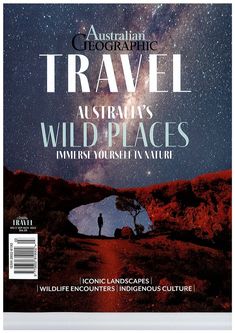 the cover of australian geographic travel magazine australia's wild places, featuring an image of a man standing on a dirt road