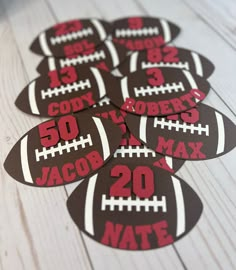 six football shaped stickers with the number twenty five on them, all printed in red and black