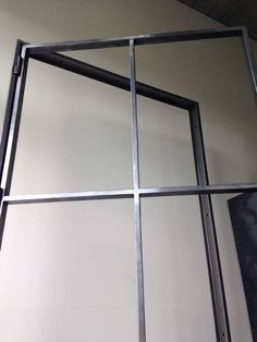 a metal frame hanging on the wall