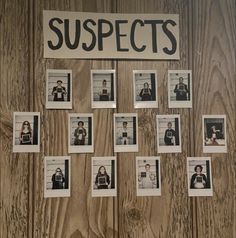 a bunch of pictures hanging on the side of a wooden wall that says suspects